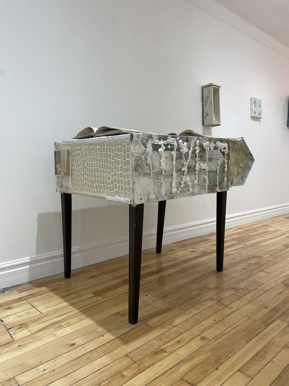 Mixed media sculpture made of wood, paint & found objects